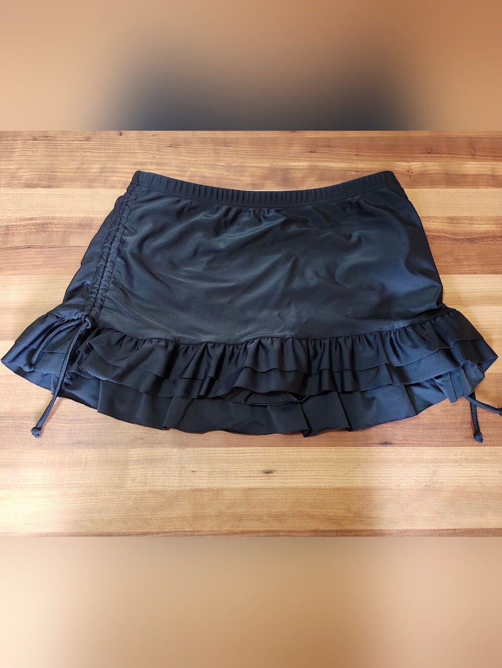 Simon Chang Black Ruffled Swim Skort.